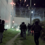 Feuerwerk und Graffiti an Knastmauern
